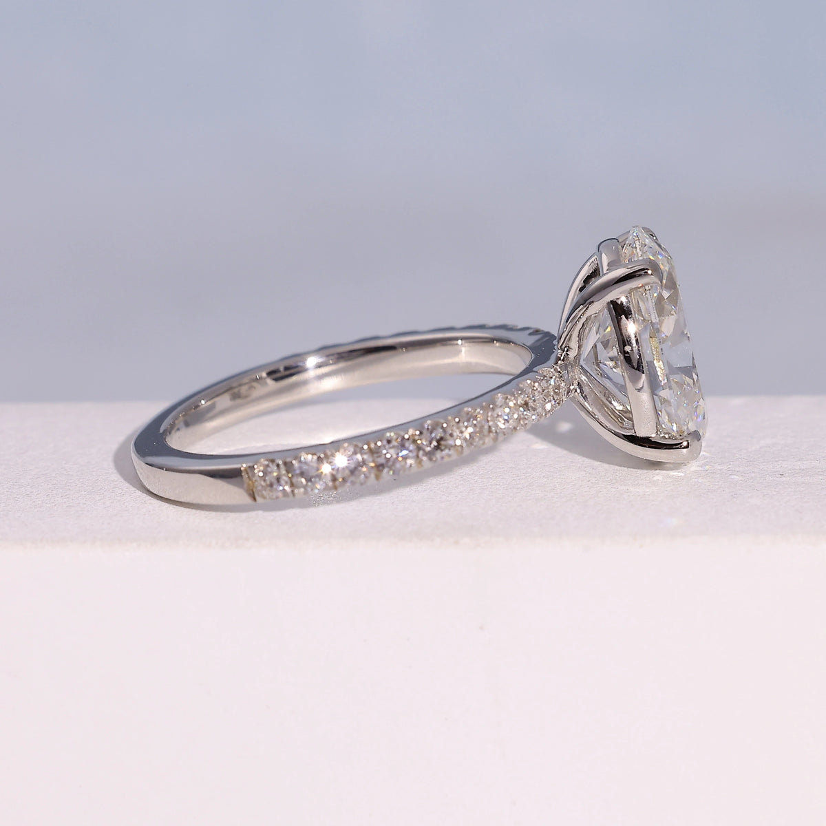 3.04 Carat Oval Cut Lab Grown Diamond Side Stone Pavé Engagement Ring - Side Profile Angle