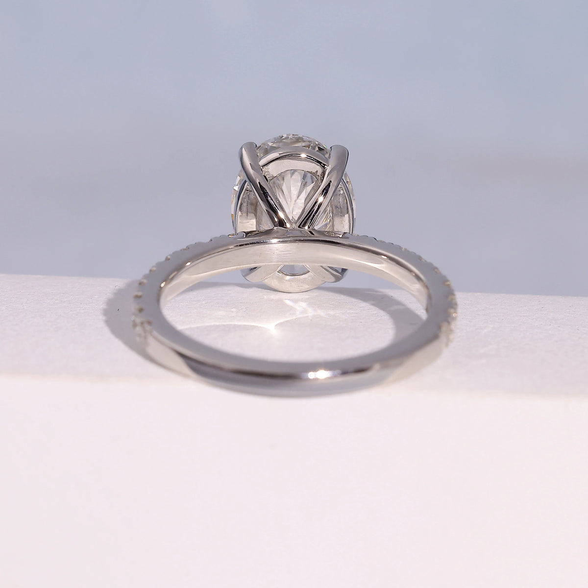 3.04 Carat Oval Cut Lab Grown Diamond Side Stone Pavé Engagement Ring - Angled Perspective