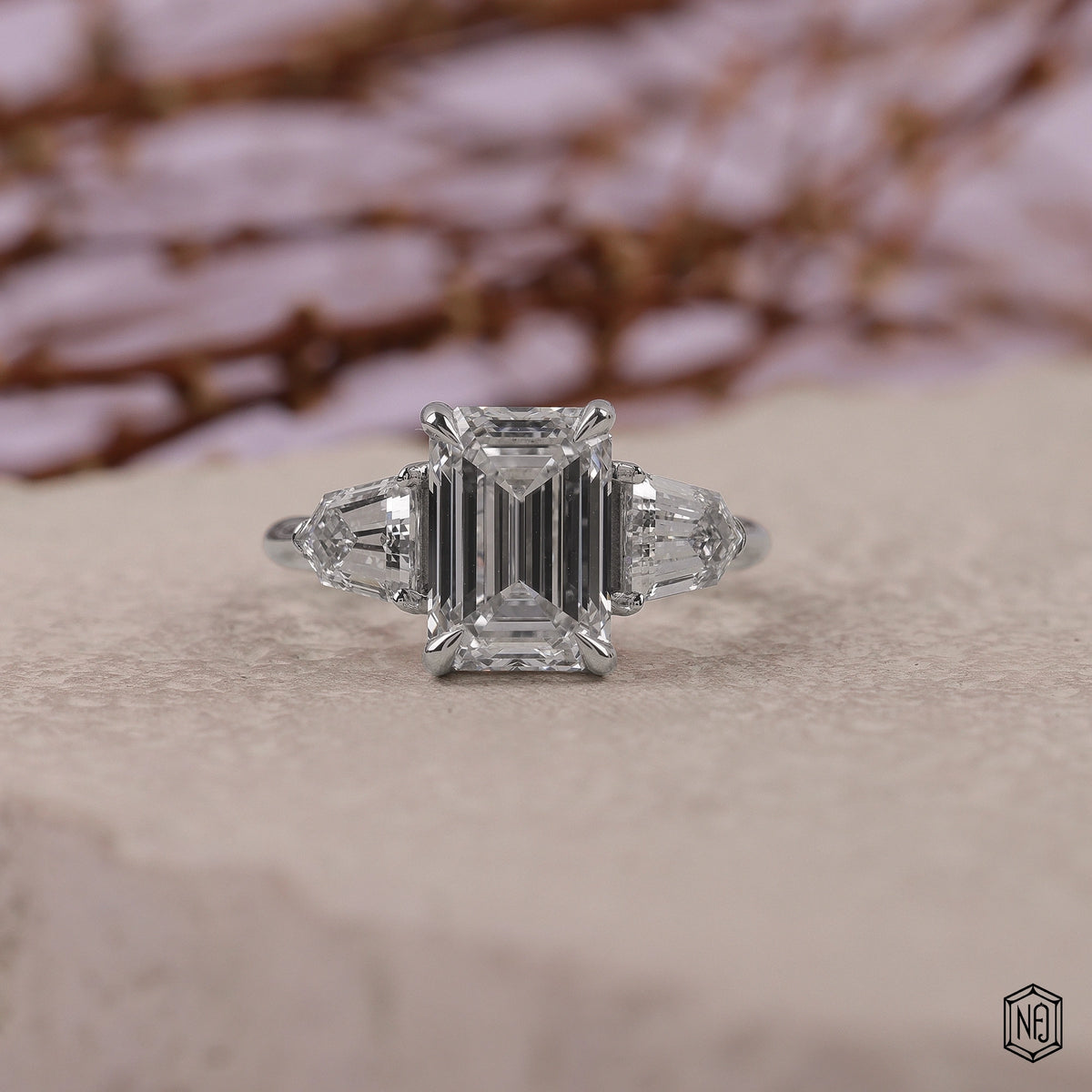 3.06 Carat Emerald Cut Lab Grown Diamond Trellis Three-Stone Engagement Ring - Front Top View