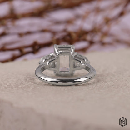 3.06 Carat Emerald Cut Lab Grown Diamond Trellis Three-Stone Engagement Ring - Hand View / Detail Angle