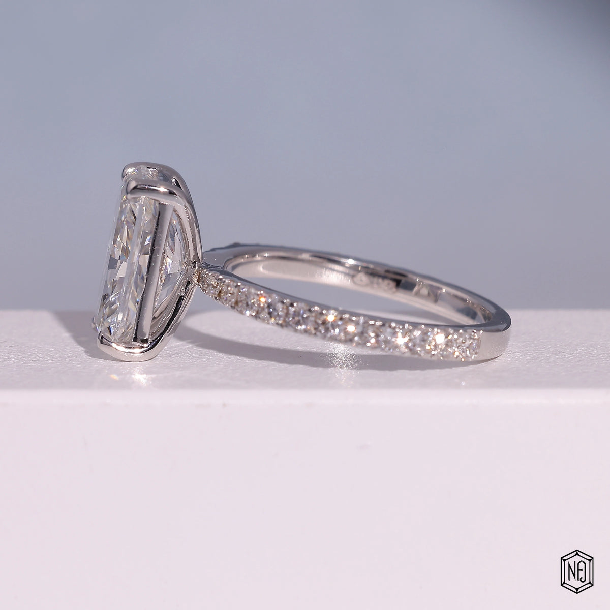 3.72 Carat Radiant Cut Lab Grown Diamond Side Stone Pavé Engagement Ring - Angled Perspective