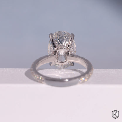 4.59 Carat Oval Cut Lab Grown Diamond Delicate Hidden Halo Engagement Ring - Hand View / Detail Angle