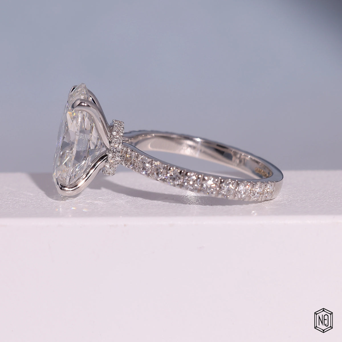 4.59 Carat Oval Cut Lab Grown Diamond Delicate Hidden Halo Engagement Ring - Angled Perspective