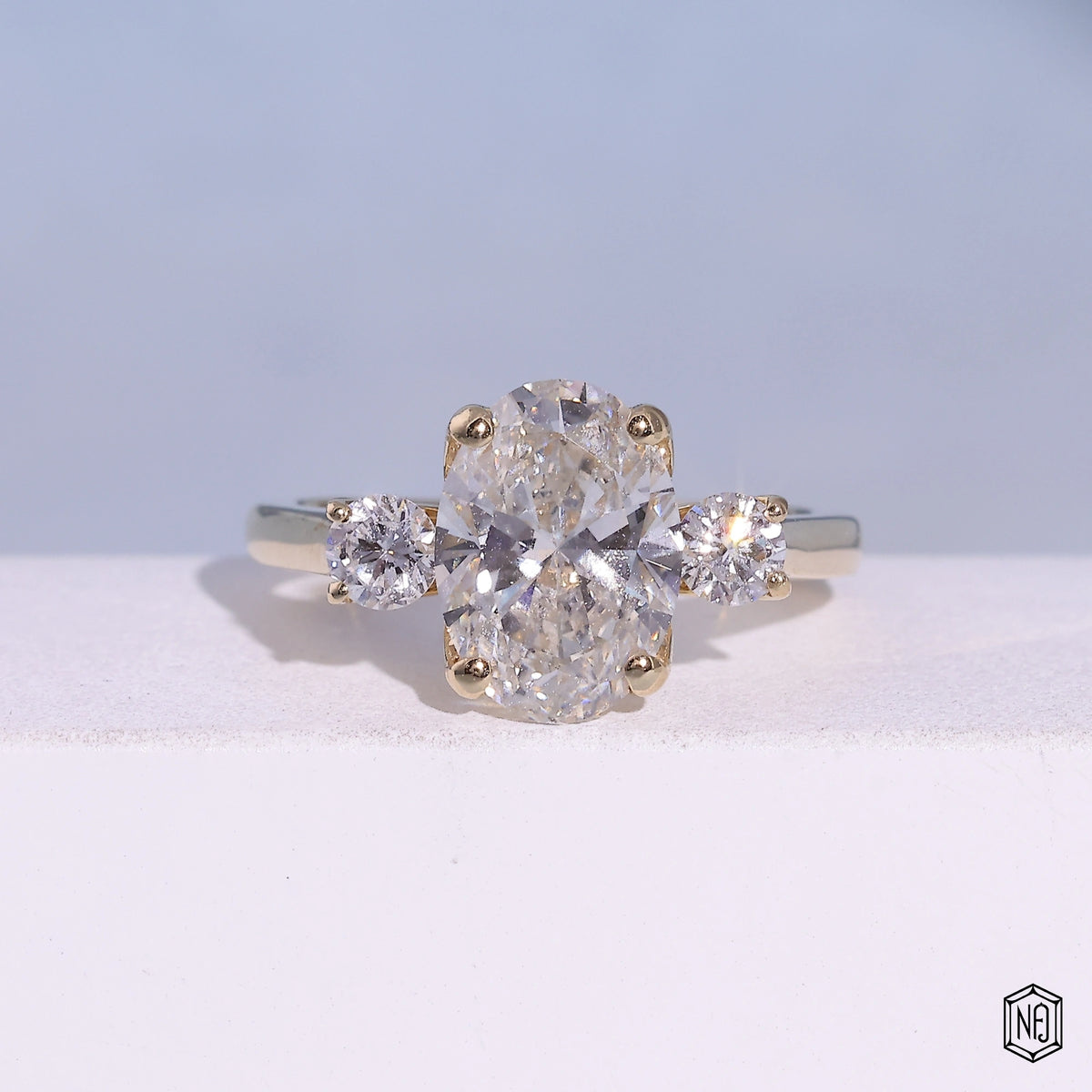 2.53 Carat Oval Cut Lab Grown Diamond Trellis Three-Stone Engagement Ring - Front Top View