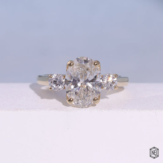 2.53 Carat Oval Cut Lab Grown Diamond Trellis Three-Stone Engagement Ring - Front Top View