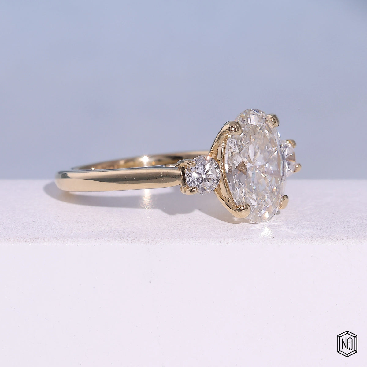 2.53 Carat Oval Cut Lab Grown Diamond Trellis Three-Stone Engagement Ring - Gallery & Prongs Detail