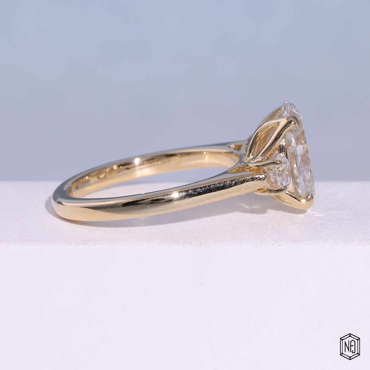 2.53 Carat Oval Cut Lab Grown Diamond Trellis Three-Stone Engagement Ring - Side Profile Angle