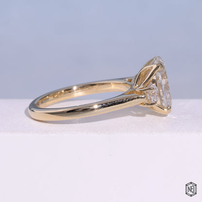 2.53 Carat Oval Cut Lab Grown Diamond Trellis Three-Stone Engagement Ring - Side Profile Angle