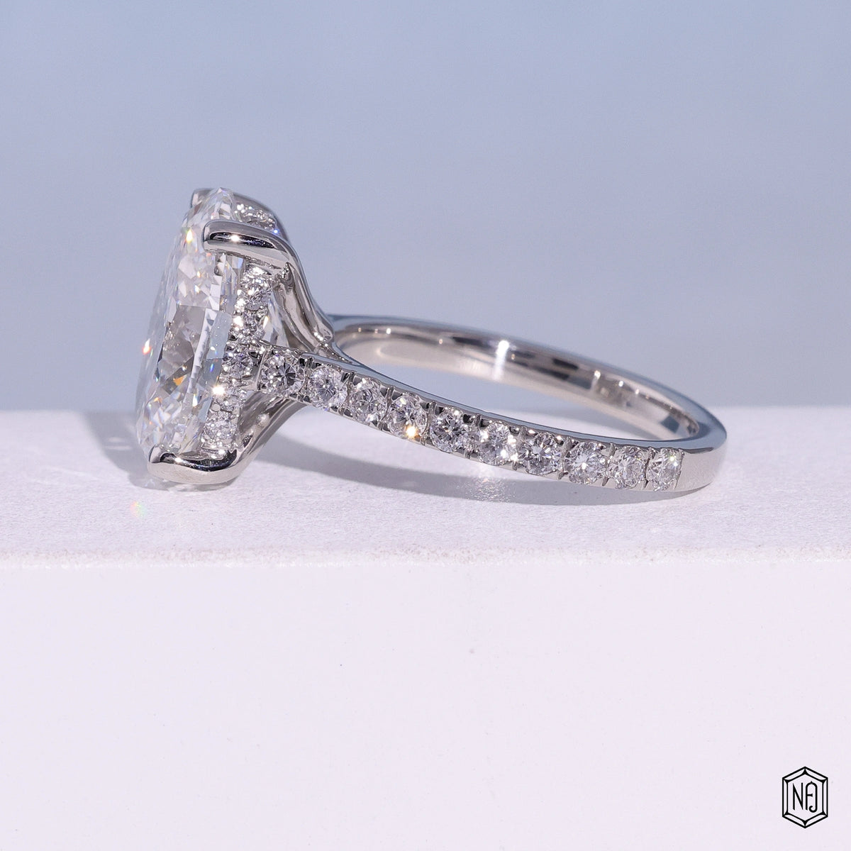 4.03 Carat Oval Cut Lab Grown Diamond Delicate Hidden Halo Engagement Ring - Angled Perspective