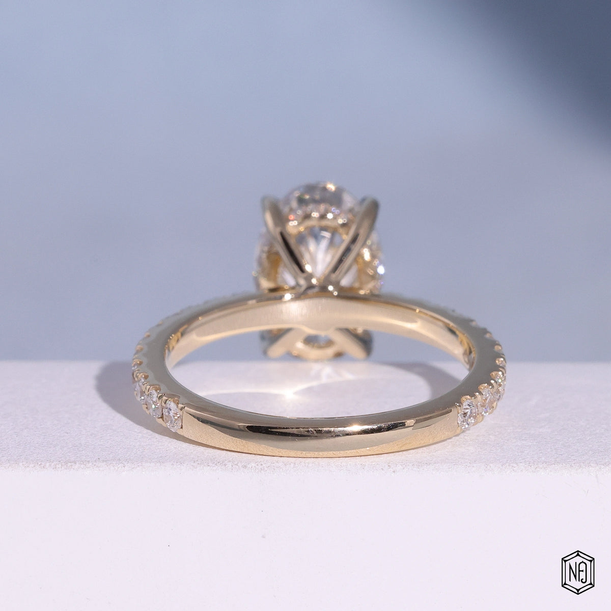 2.6 Carat Oval Cut Lab Grown Diamond Delicate Hidden Halo Engagement Ring - Hand View / Detail Angle