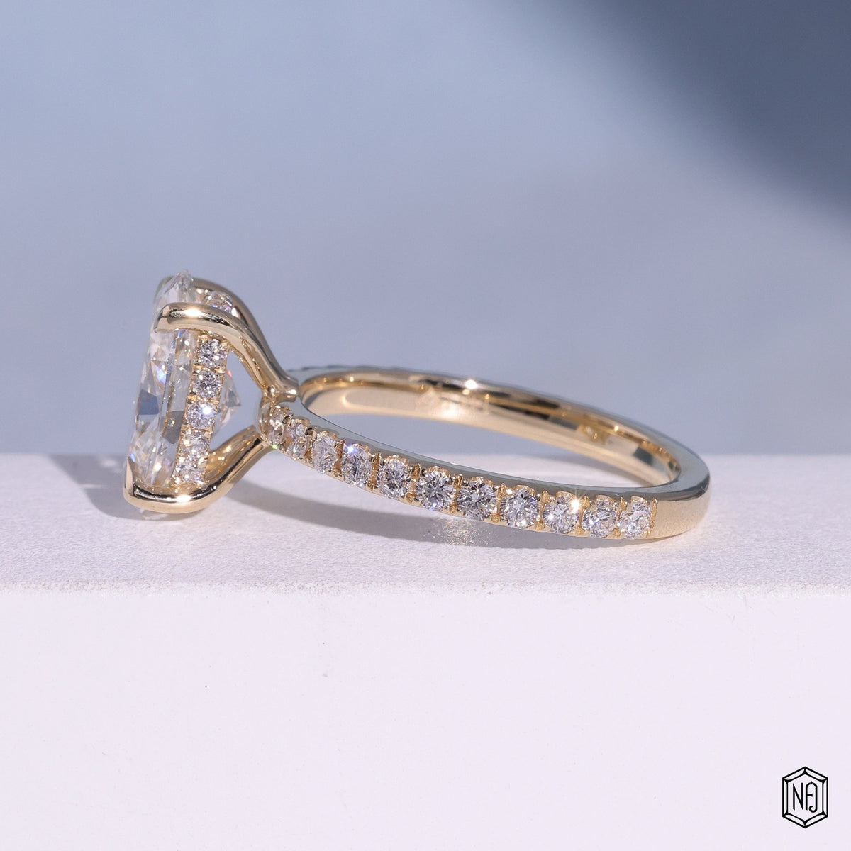 2.6 Carat Oval Cut Lab Grown Diamond Delicate Hidden Halo Engagement Ring - Angled Perspective