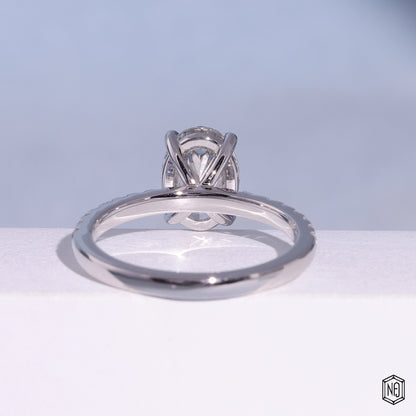 2.09 Carat Oval Cut Lab Grown Diamond Side Stone Pavé Engagement Ring - Hand View / Detail Angle