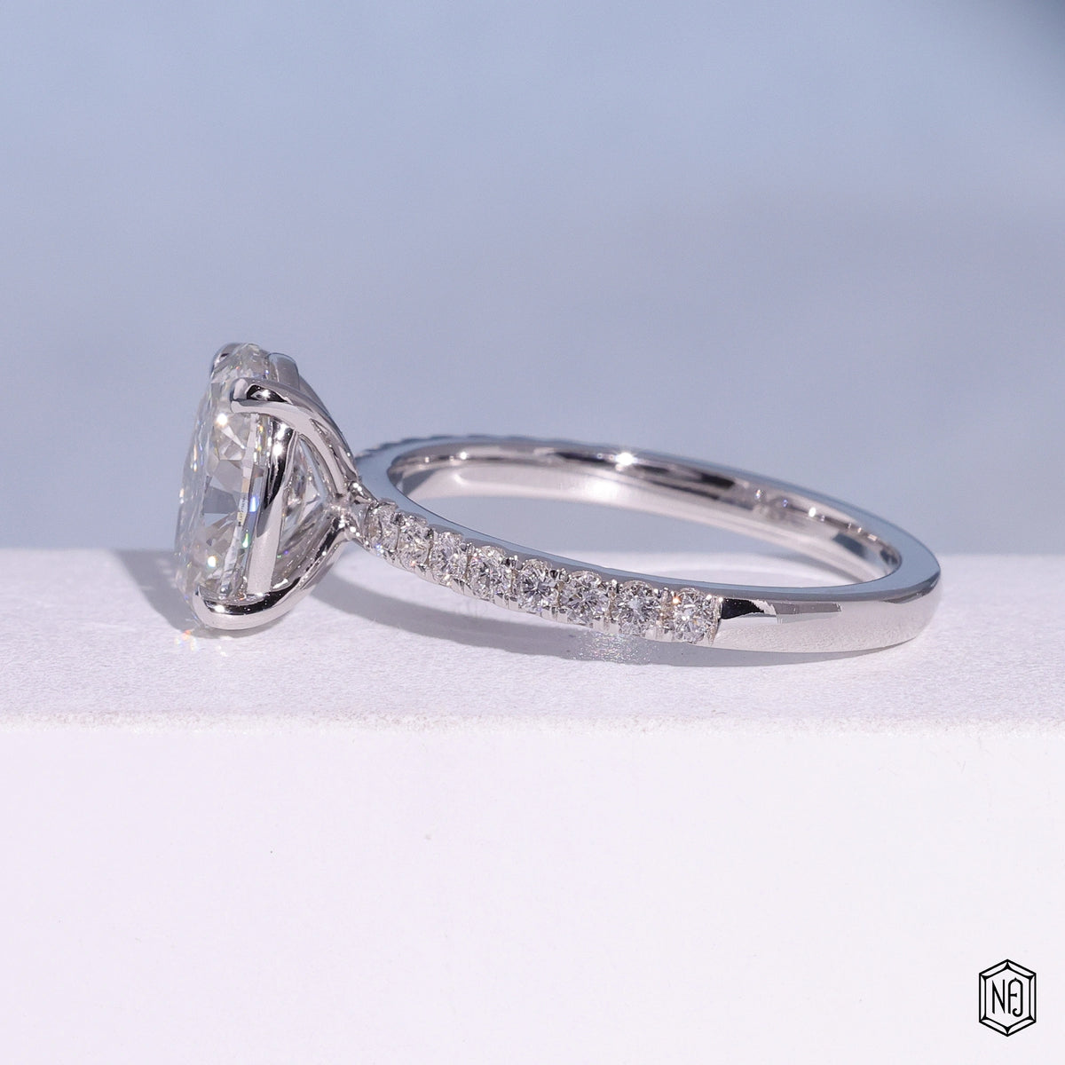 2.09 Carat Oval Cut Lab Grown Diamond Side Stone Pavé Engagement Ring - Angled Perspective