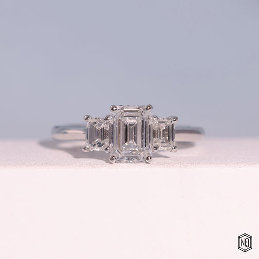 1.24 Carat Emerald Cut Lab Grown Diamond Trellis Three-Stone Engagement Ring - Front Top View