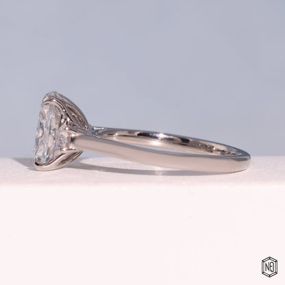 2.42 Carat Cushion Cut Lab Grown Diamond Trellis Three-Stone Engagement Ring - Angled Perspective