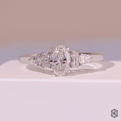 0.72 Carat Oval Cut Lab Grown Diamond Trellis Three-Stone Engagement Ring - Front Top View