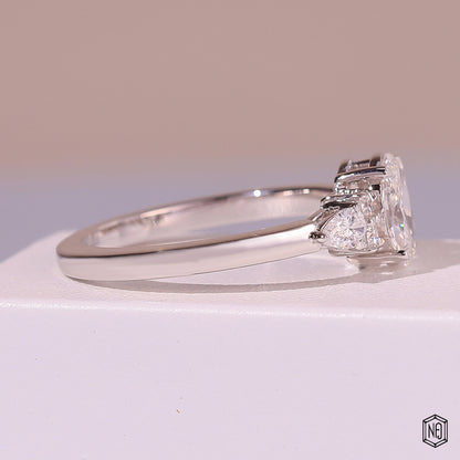 0.72 Carat Oval Cut Lab Grown Diamond Trellis Three-Stone Engagement Ring - Angled Perspective