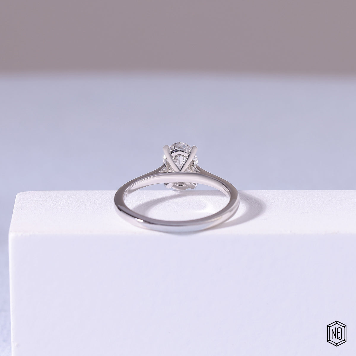 1.5 Carat Oval Cut Lab Grown Diamond Classic Solitaire Engagement Ring - Hand View / Detail Angle