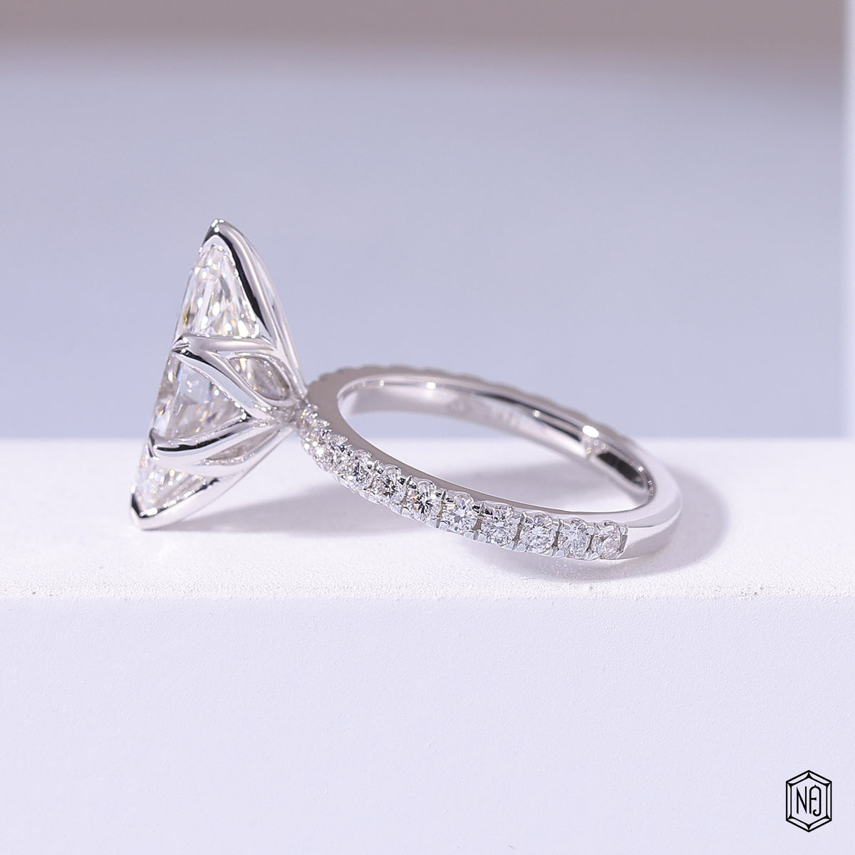 0.72 Carat Marquise Cut Lab Grown Diamond Side Stone Pavé Engagement Ring - Angled Perspective