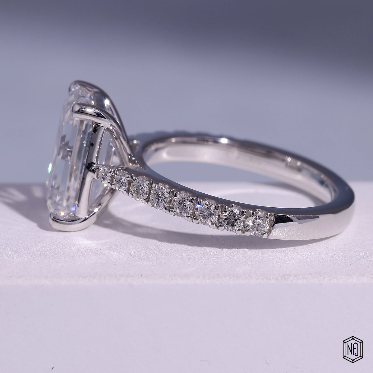 3.71 Carat Emerald Cut Lab Grown Diamond Side Stone Pavé Engagement Ring - Angled Perspective