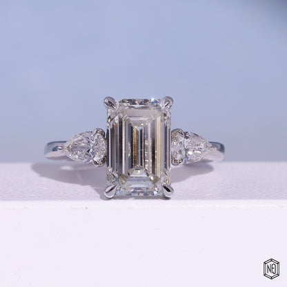 4.71 Carat Emerald Cut Lab Grown Diamond Trellis Three-Stone Engagement Ring - Front Top View