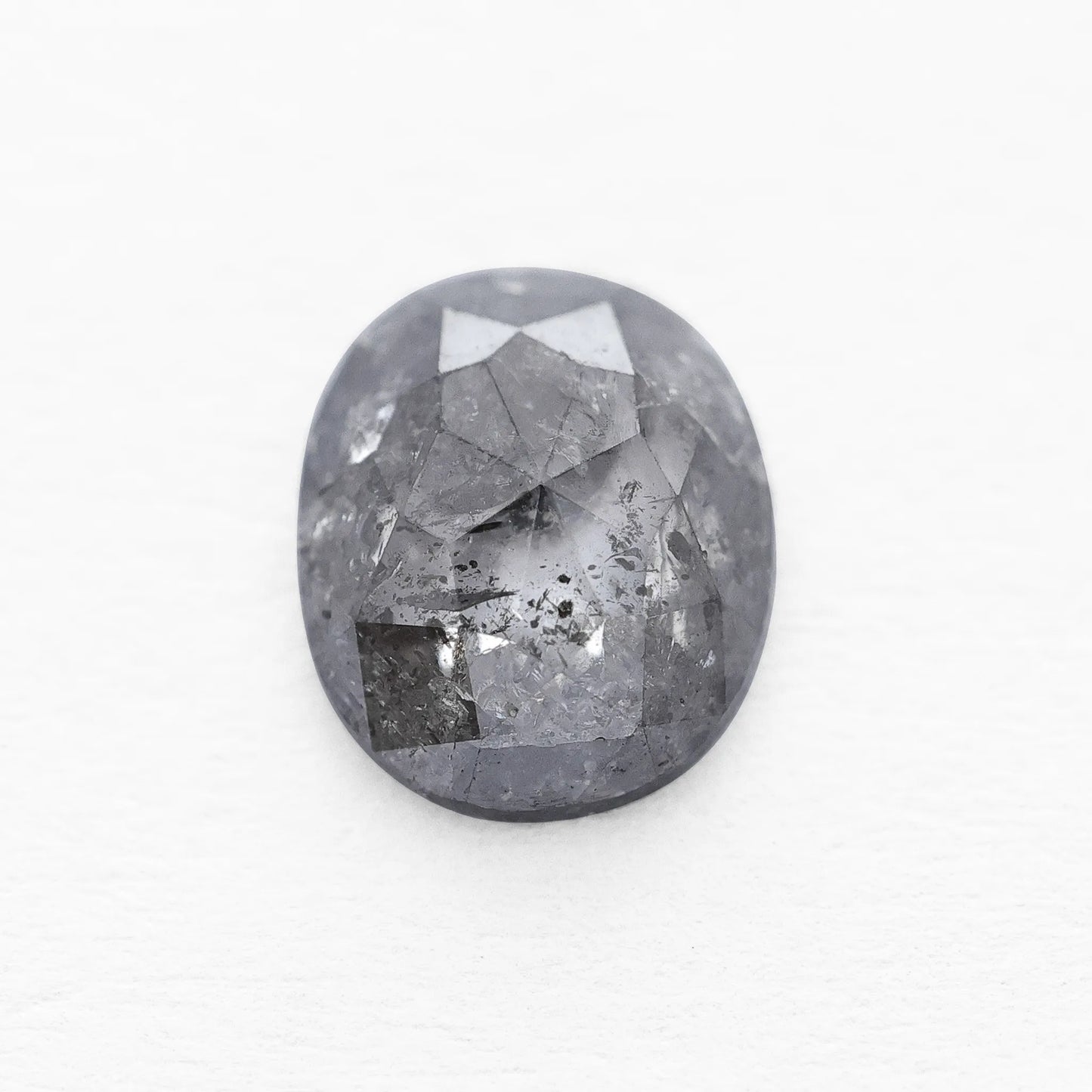 0.66 Ct Oval Cut / Facet Style Salt and Pepper Diamond