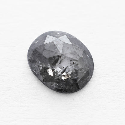 0.66 Ct Oval Cut / Facet Style Salt and Pepper Diamond