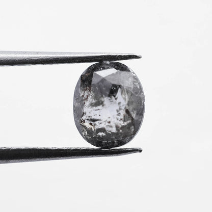 0.66 Ct Oval Cut / Facet Style Salt and Pepper Diamond