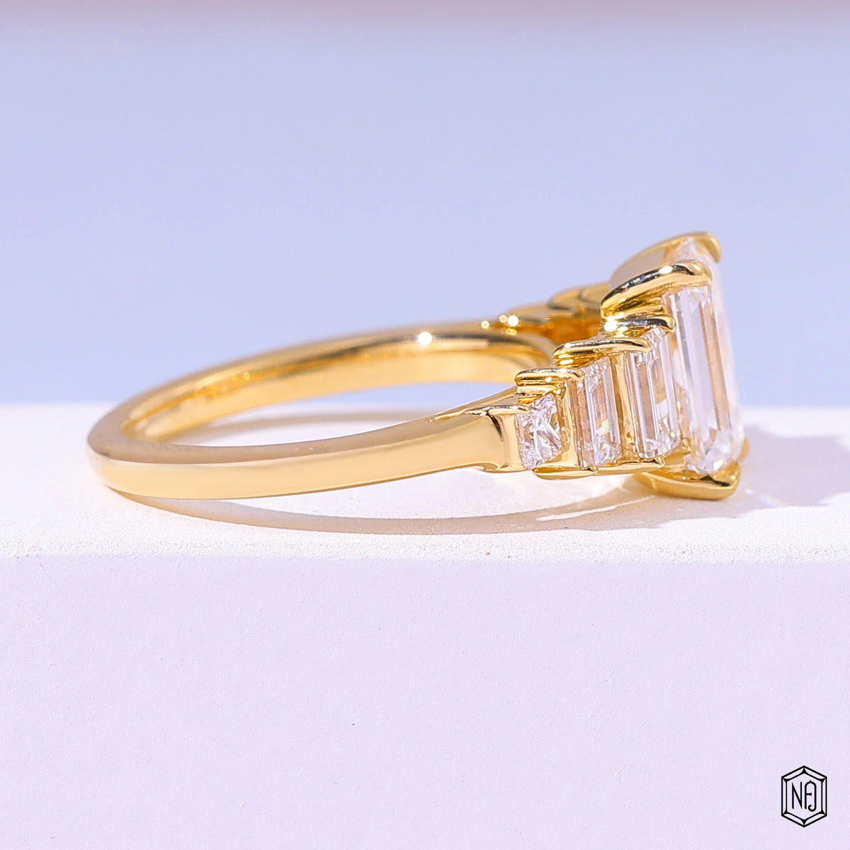 2.5 Carat Emerald Cut Lab Grown Diamond Trellis Three-Stone Engagement Ring - Side Profile Angle