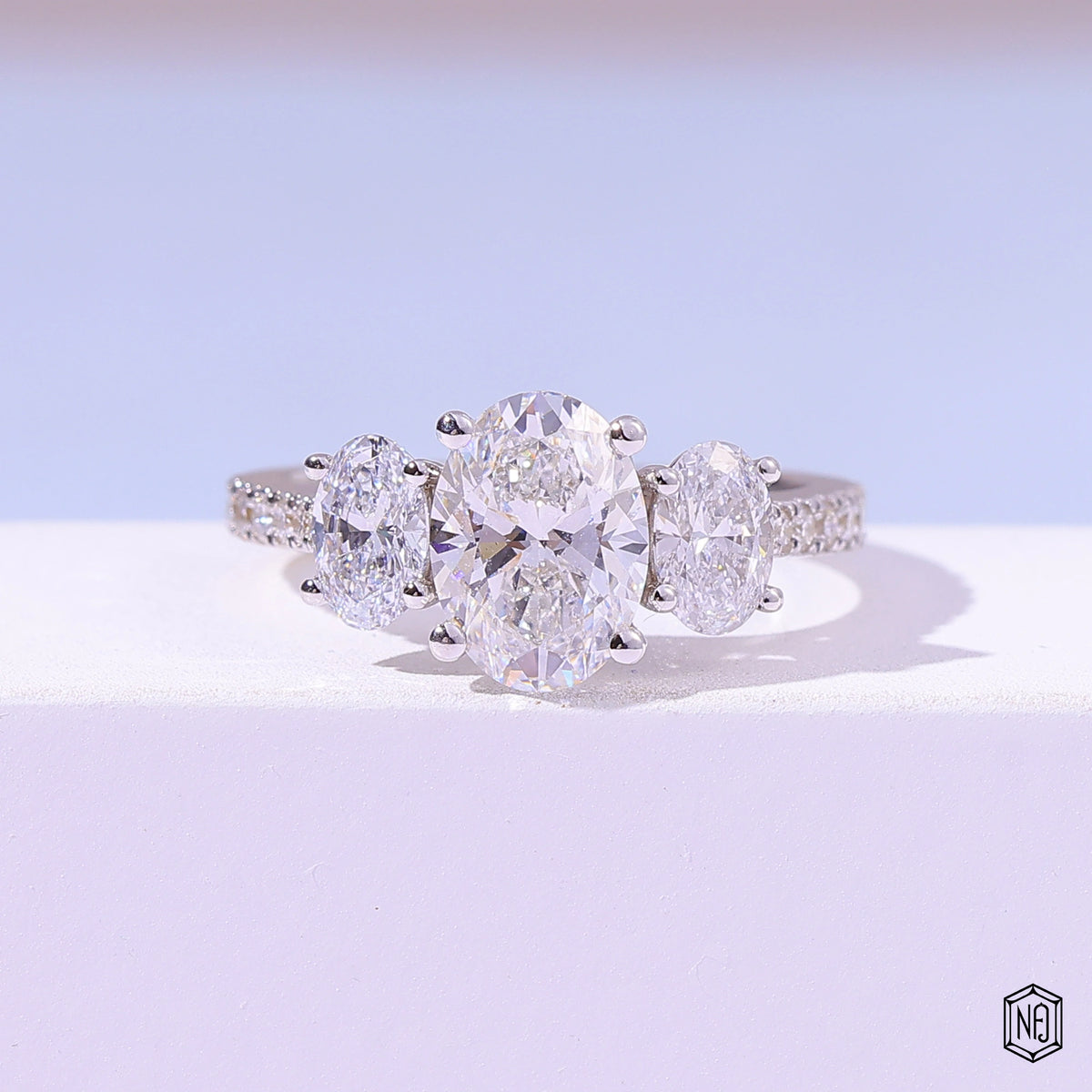 2 Carat Oval Cut Lab Grown Diamond Trellis Three-Stone Engagement Ring - Front Top View