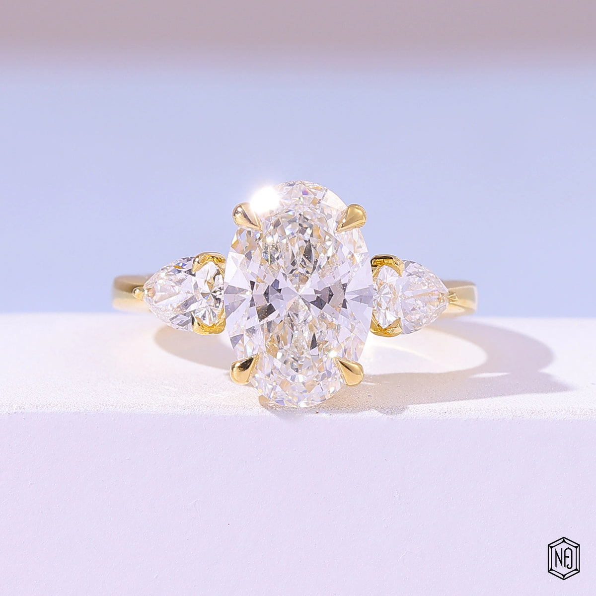 4.06 Carat Oval Cut Lab Grown Diamond Trellis Three-Stone Engagement Ring - Front Top View