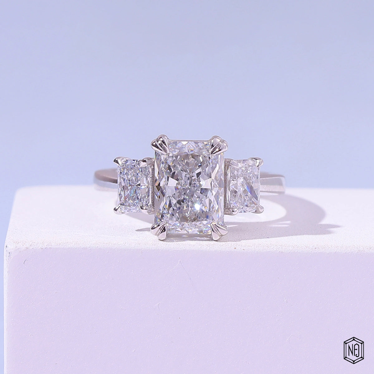 2.52 Carat Radiant Cut Lab Grown Diamond Trellis Three-Stone Engagement Ring - Front Top View