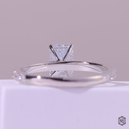 1.47 Carat Emerald Cut Lab Grown Diamond Side Stone Pavé Engagement Ring - Hand View / Detail Angle