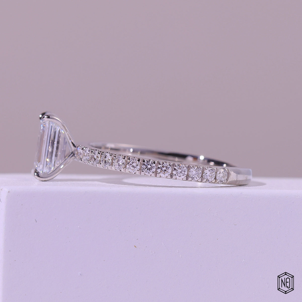 1.47 Carat Emerald Cut Lab Grown Diamond Side Stone Pavé Engagement Ring - Angled Perspective