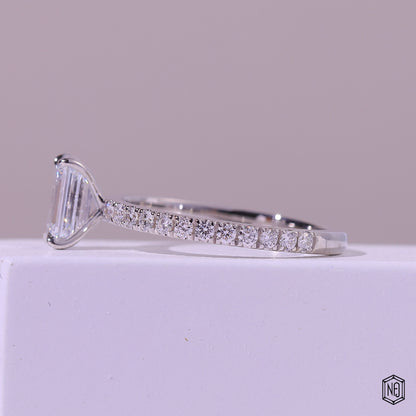 1.47 Carat Emerald Cut Lab Grown Diamond Side Stone Pavé Engagement Ring - Angled Perspective