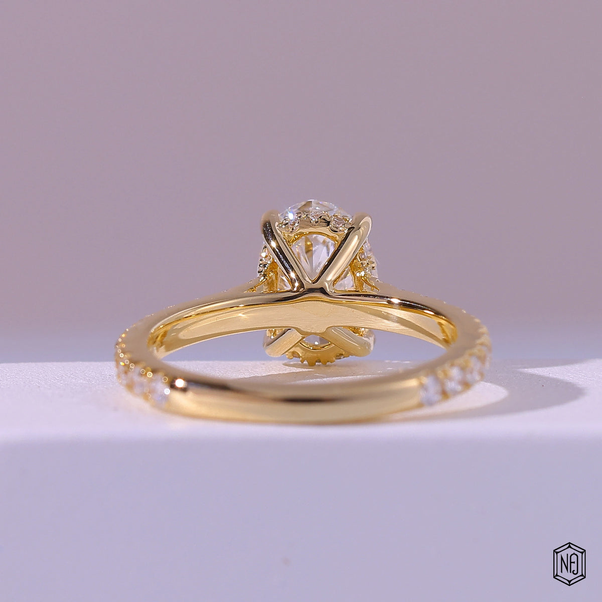 1.58 Carat Oval Cut Lab Grown Diamond Delicate Hidden Halo Engagement Ring - Hand View / Detail Angle