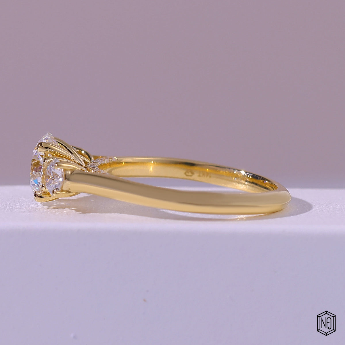 1.19 Carat Round Cut Lab Grown Diamond Trellis Three-Stone Engagement Ring - Angled Perspective