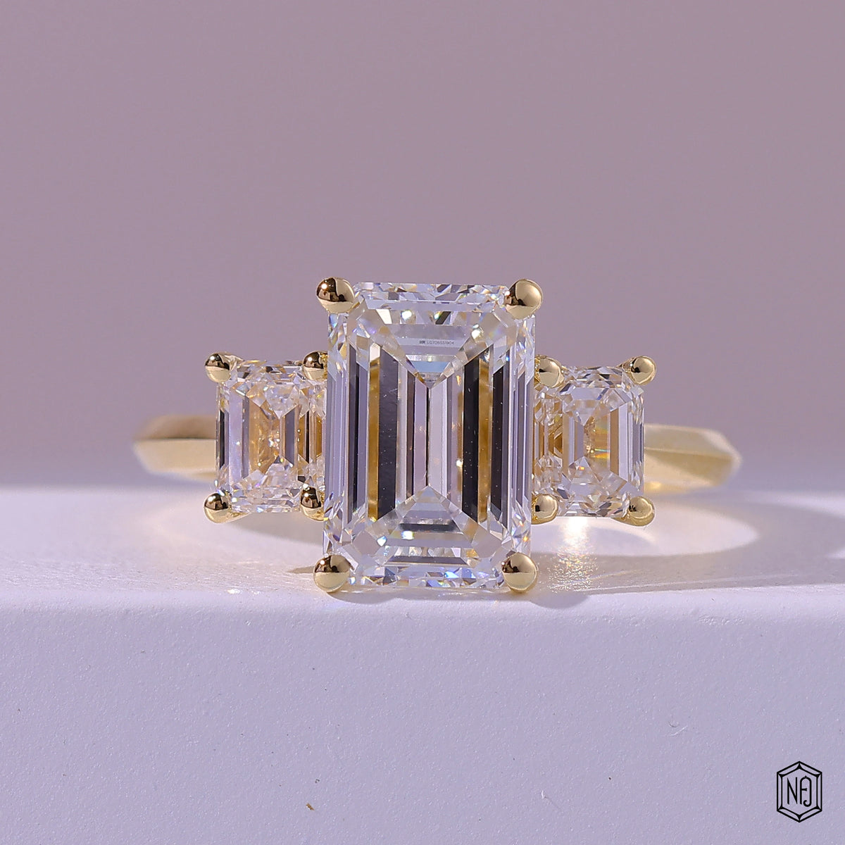2.99 Carat Emerald Cut Lab Grown Diamond Trellis Three-Stone Engagement Ring - Front Top View