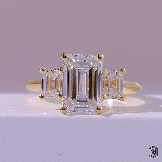 2.99 Carat Emerald Cut Lab Grown Diamond Trellis Three-Stone Engagement Ring - Front Top View