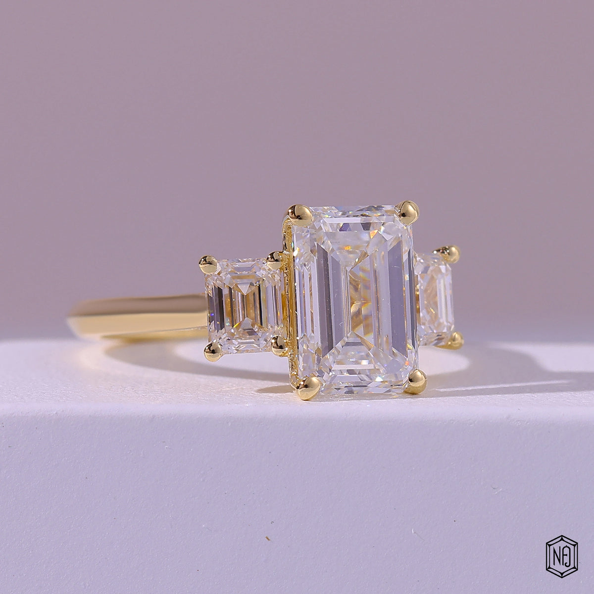2.99 Carat Emerald Cut Lab Grown Diamond Trellis Three-Stone Engagement Ring - Gallery & Prongs Detail