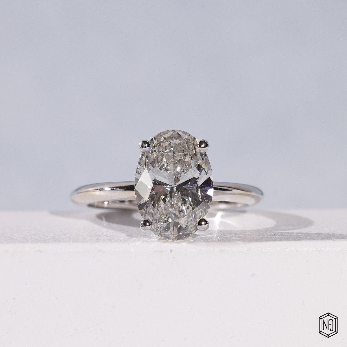 Oval Cut Lab Grown Diamond Solitaire Engagement Ring with 4-Prong Ball Crown