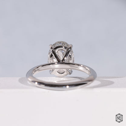 Oval Cut Lab Grown Diamond Solitaire Engagement Ring with 4-Prong Ball Crown