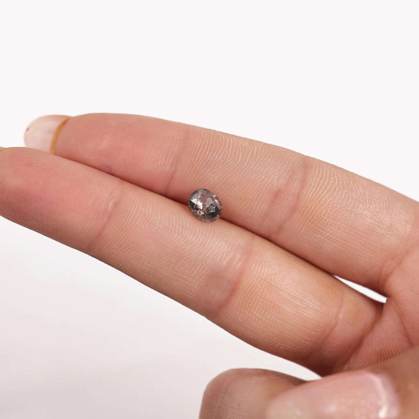 0.66 Ct Oval Cut / Facet Style Salt and Pepper Diamond