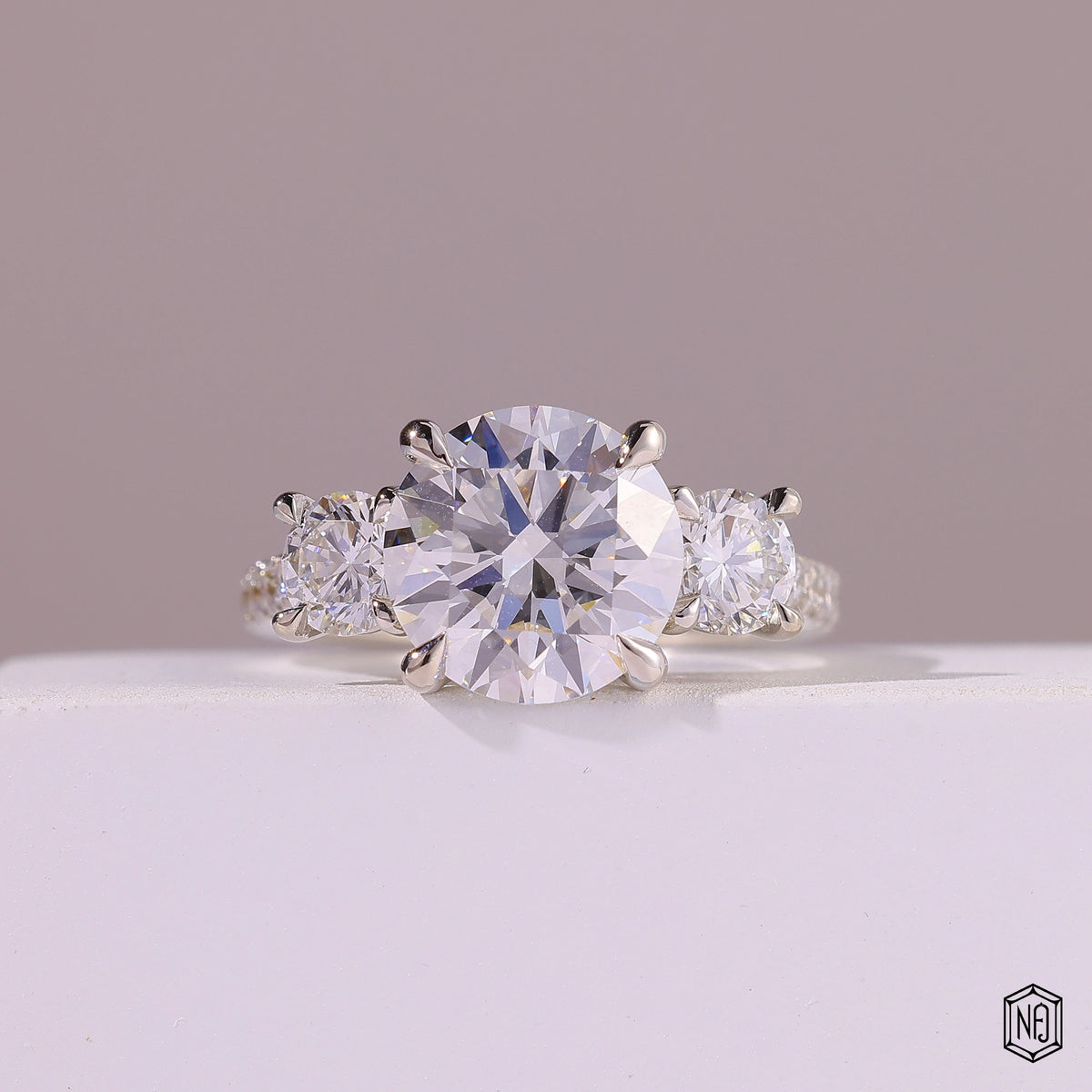 4.09 Carat Round Cut Lab Grown Diamond Trellis Three-Stone Engagement Ring - Front Top View