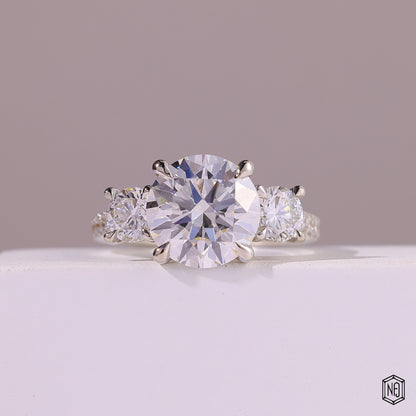 4.09 Carat Round Cut Lab Grown Diamond Trellis Three-Stone Engagement Ring - Front Top View