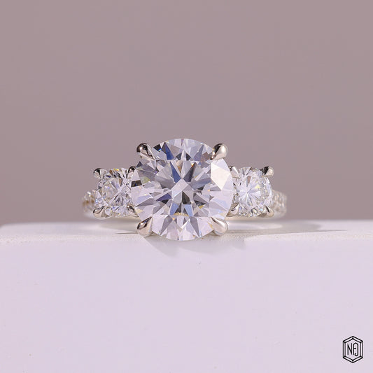 4.09 Carat Round Cut Lab Grown Diamond Trellis Three-Stone Engagement Ring - Front Top View