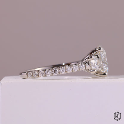 4.09 Carat Round Cut Lab Grown Diamond Trellis Three-Stone Engagement Ring - Side Profile Angle