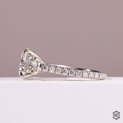 4.09 Carat Round Cut Lab Grown Diamond Trellis Three-Stone Engagement Ring - Angled Perspective