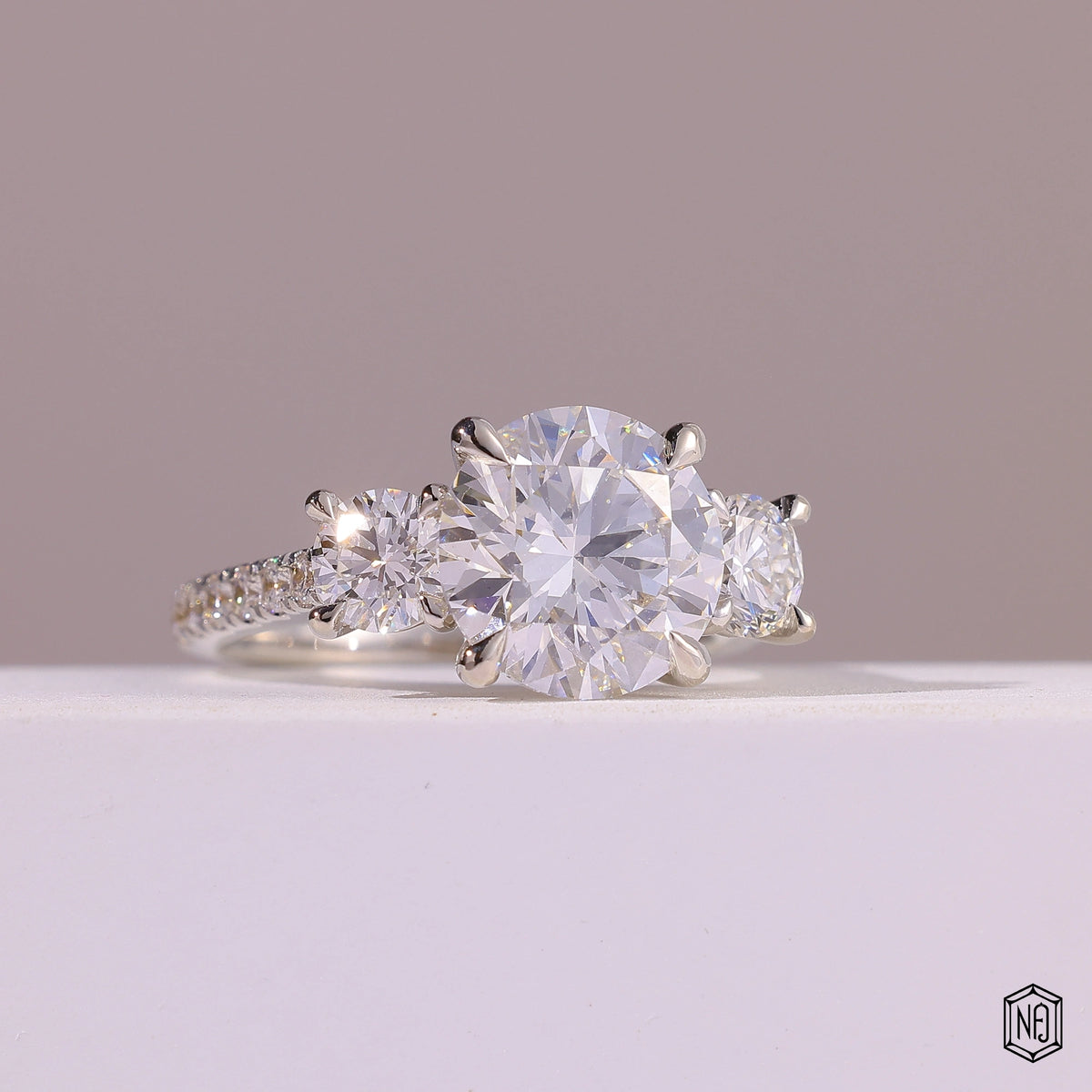 4.09 Carat Round Cut Lab Grown Diamond Trellis Three-Stone Engagement Ring - Gallery & Prongs Detail