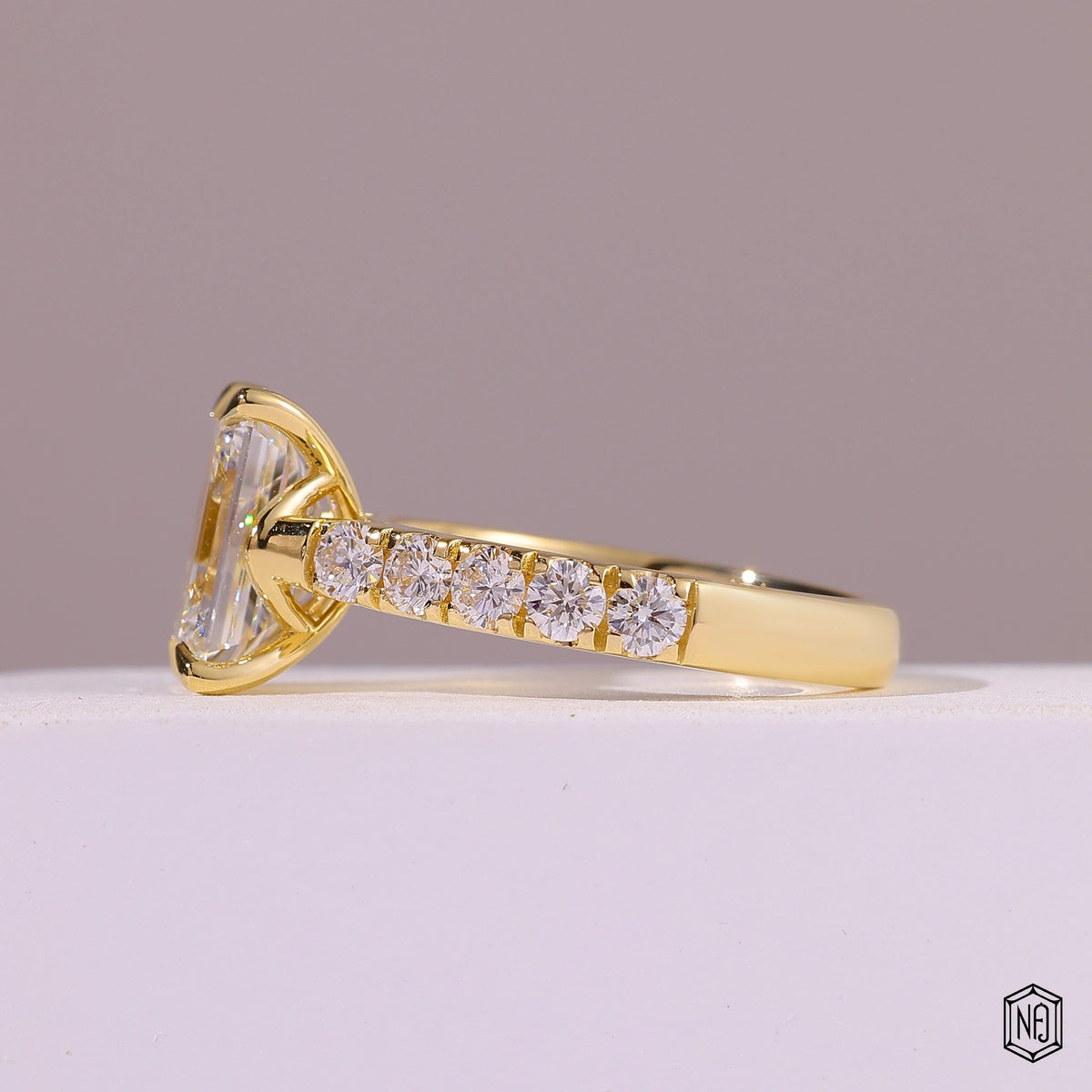 2.8 Carat Emerald Cut Lab Grown Diamond Side Stone Pavé Engagement Ring - Angled Perspective